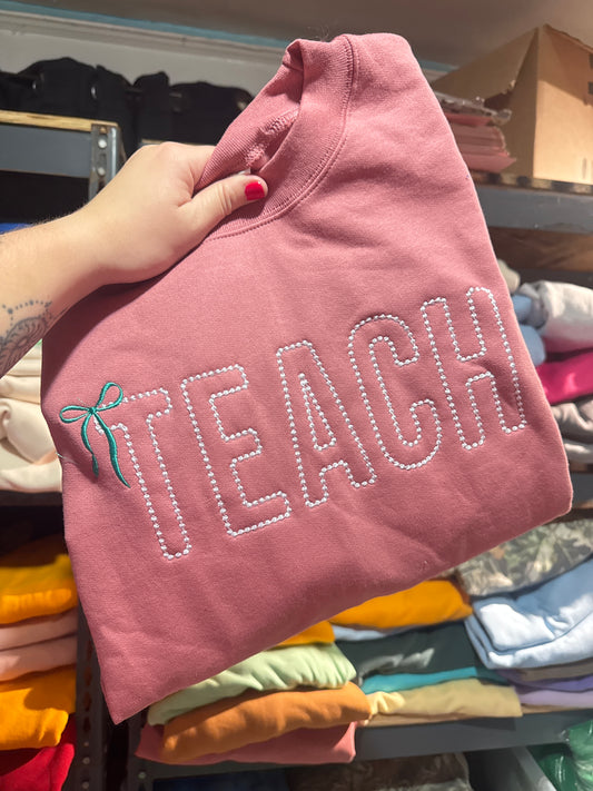 TEACH with bow Crewneck